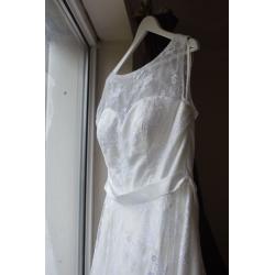 White wedding dress, size 14. Cleaned and comes with dress bag