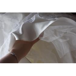 White wedding dress, size 14. Cleaned and comes with dress bag