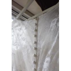 White wedding dress, size 14. Cleaned and comes with dress bag