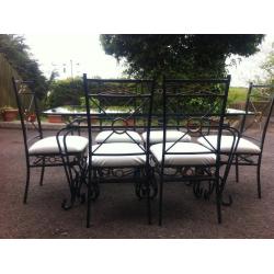 GLASS TABLE WITH 6 CHAIRS.