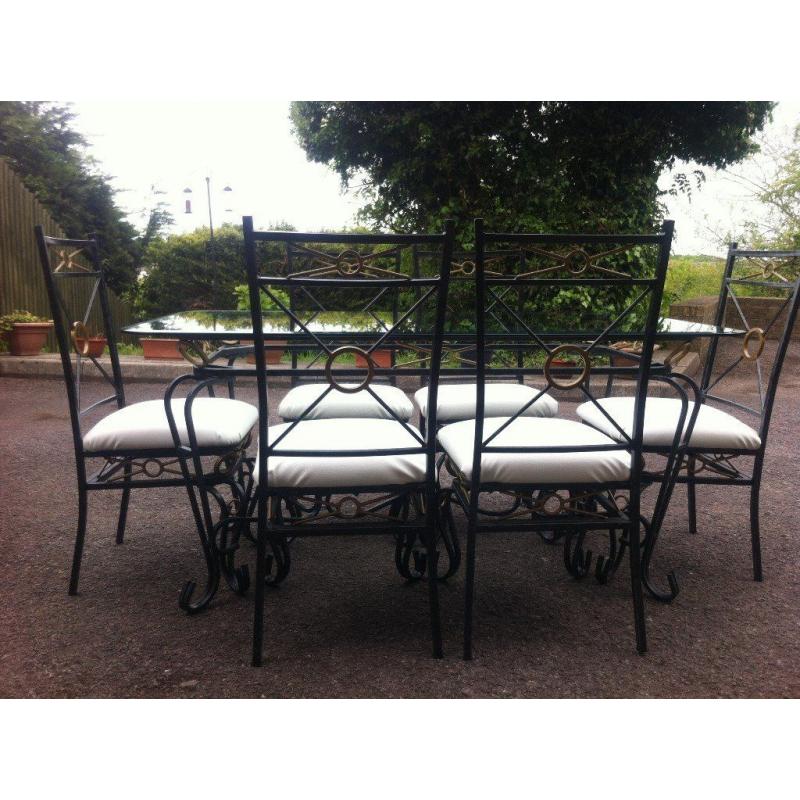 GLASS TABLE WITH 6 CHAIRS.
