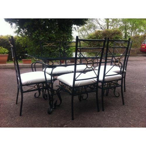 GLASS TABLE WITH 6 CHAIRS.