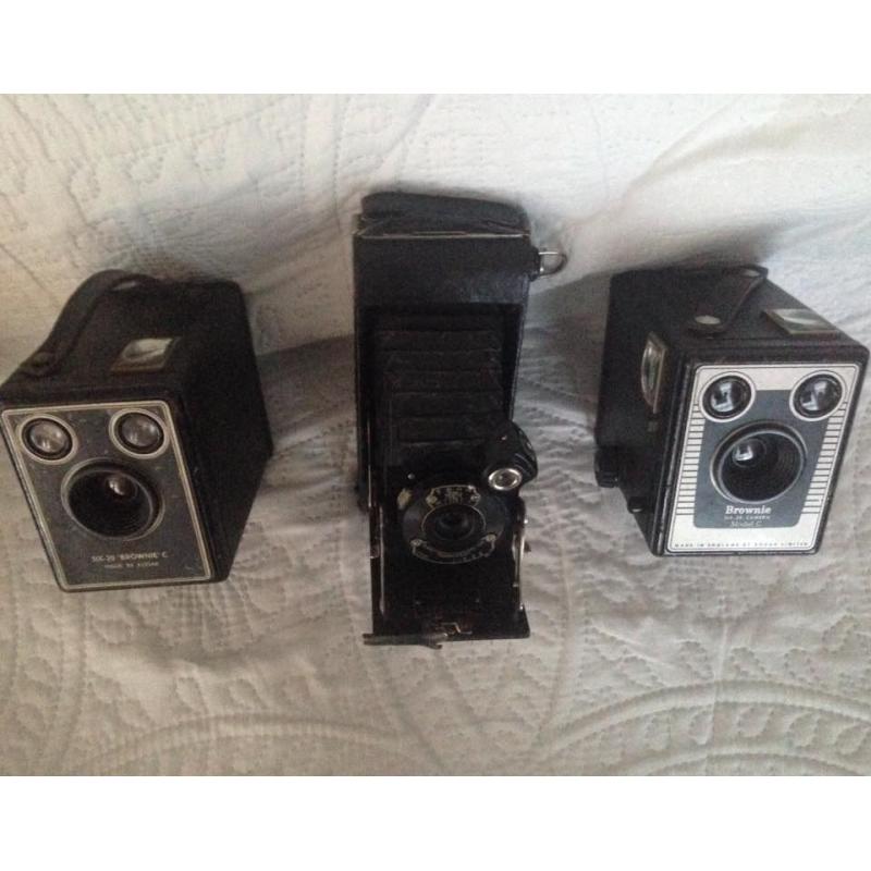 Three box brownie cameras x cases.