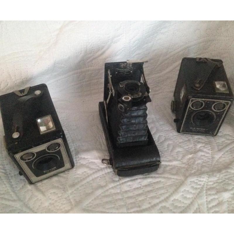 Three box brownie cameras x cases.