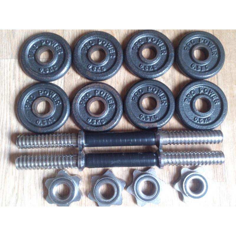 8x 0.5 kg standard iron weight plates and 2 40 cm dumbells