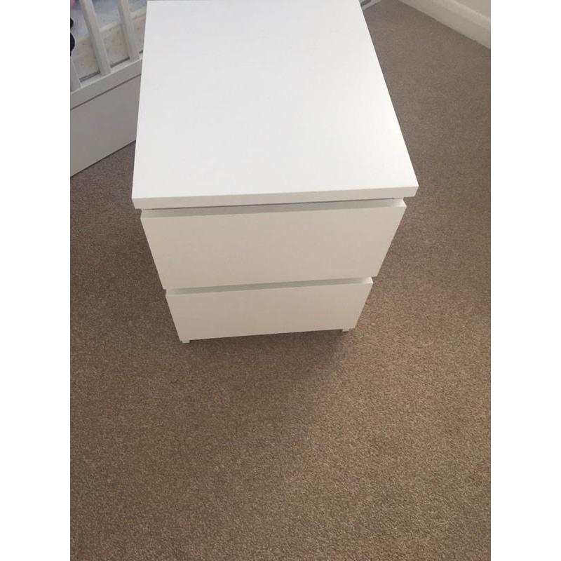 White IKEA bedside drawers