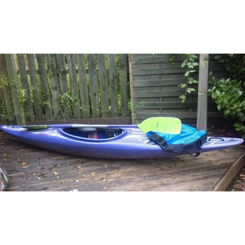 Kayak with skirt and paddle
