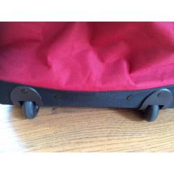 Huge red holdall. Good condition.