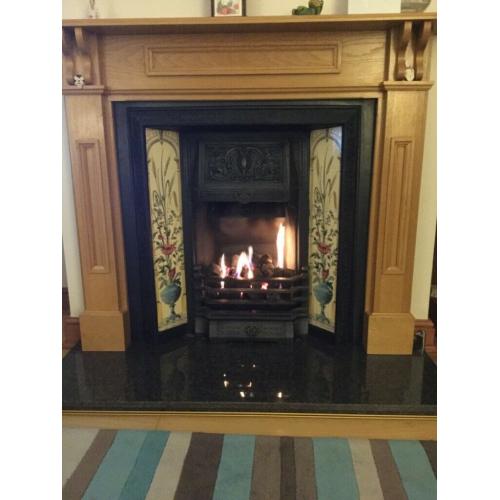 Cast iron fire surround complete with gas fire