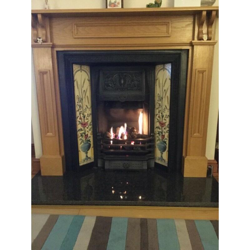 Cast iron fire surround complete with gas fire
