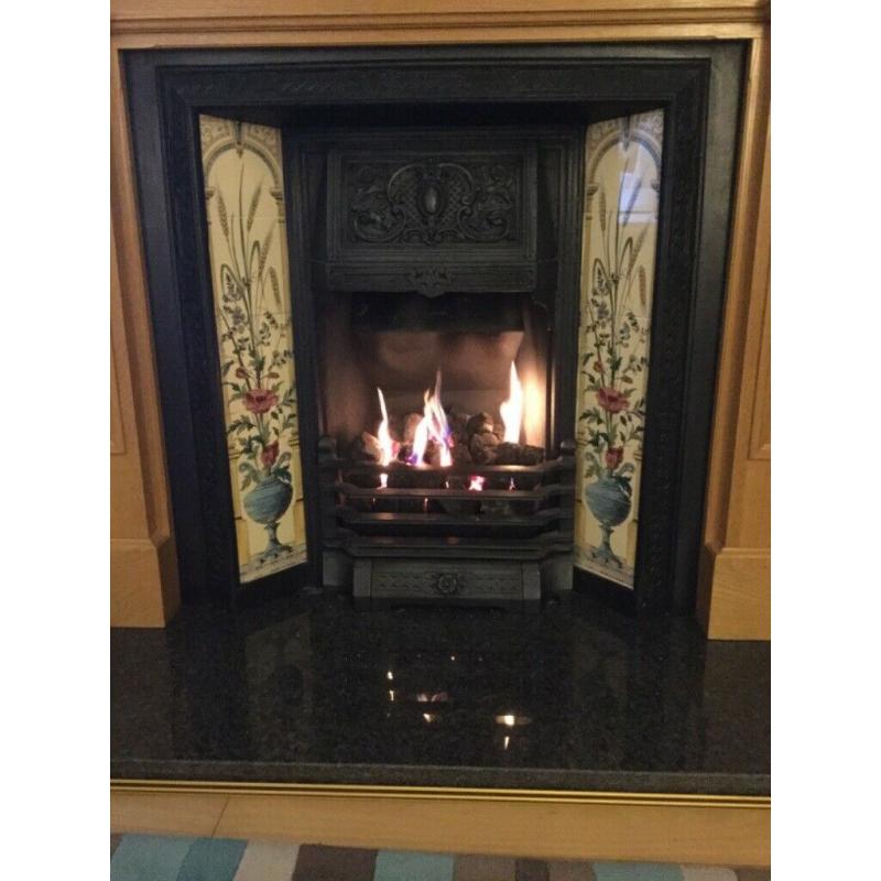 Cast iron fire surround complete with gas fire