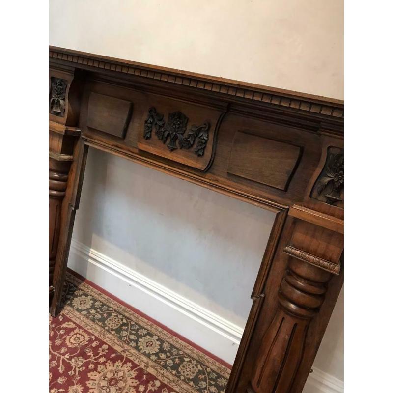 Edwardian style Mahogany fire surround with cast iron inlay