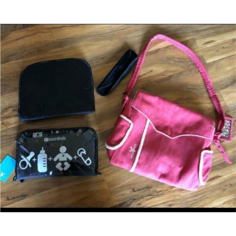 Red Wallaboo baby change bag with accessories