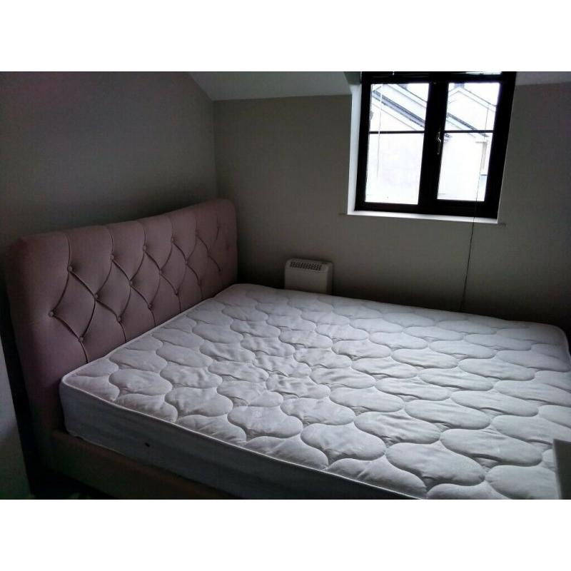 King size upholstered bed