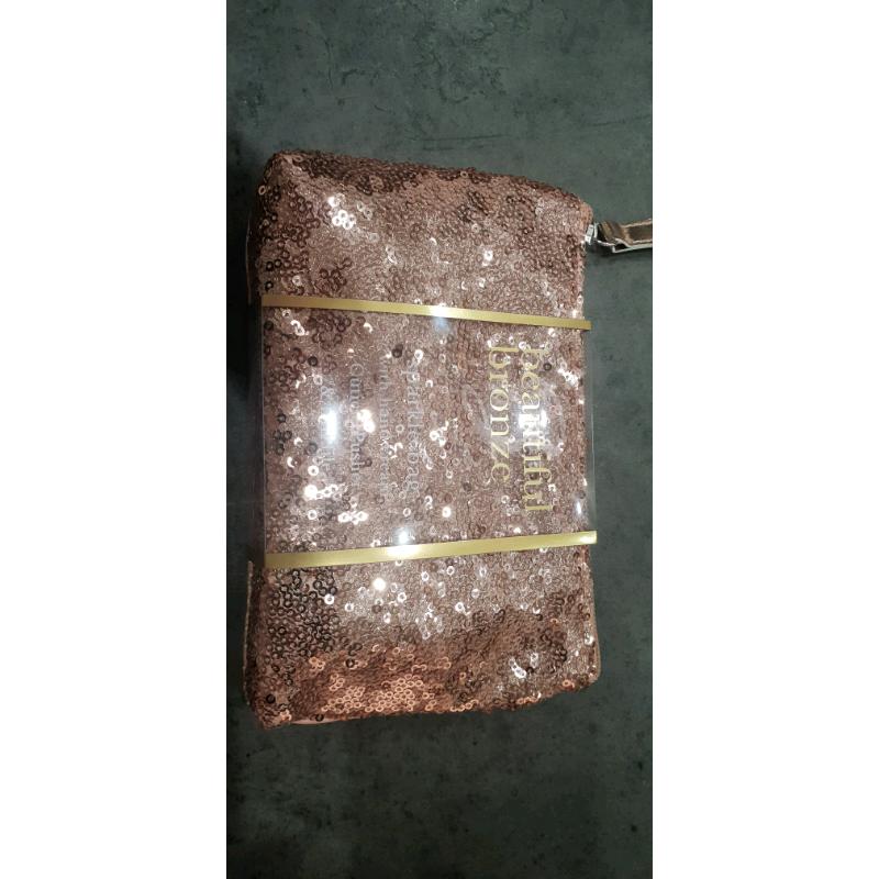 New beautiful bronze sparkle bag