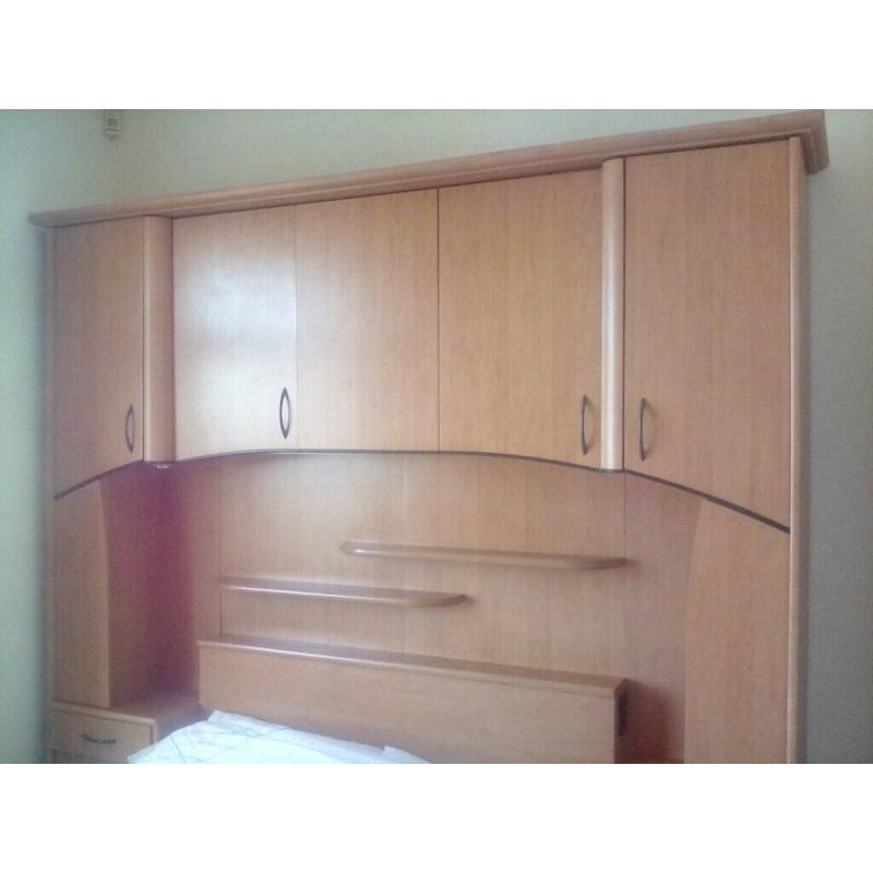 Overbed storage unit including double bed, drawers and cupboard