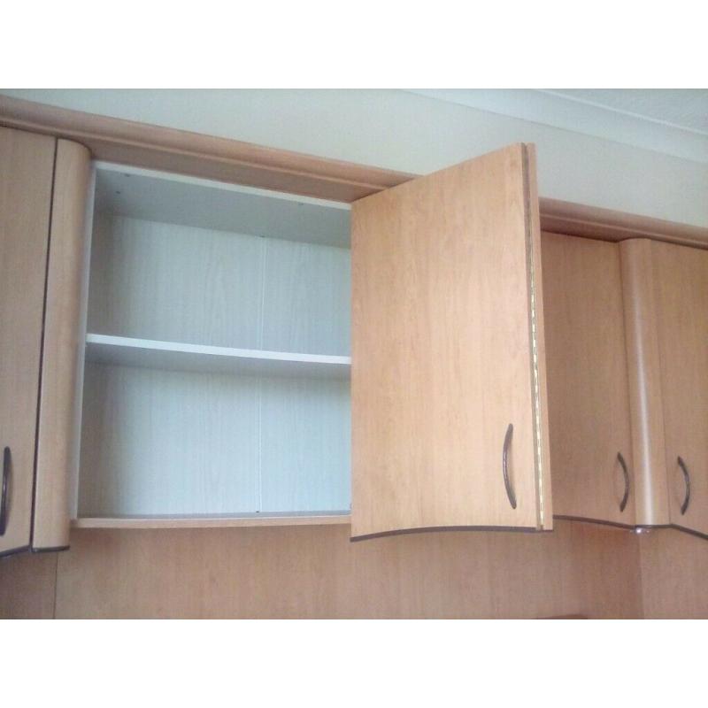 Overbed storage unit including double bed, drawers and cupboard