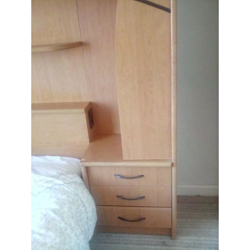 Overbed storage unit including double bed, drawers and cupboard