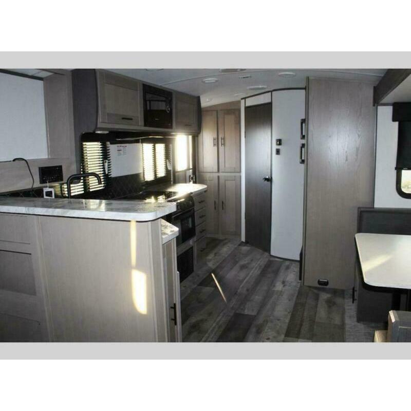 2021 HEARTLAND SUNDANCE 221RB 22FT SLIDEOUT American Caravan 5th Wheel Trailer