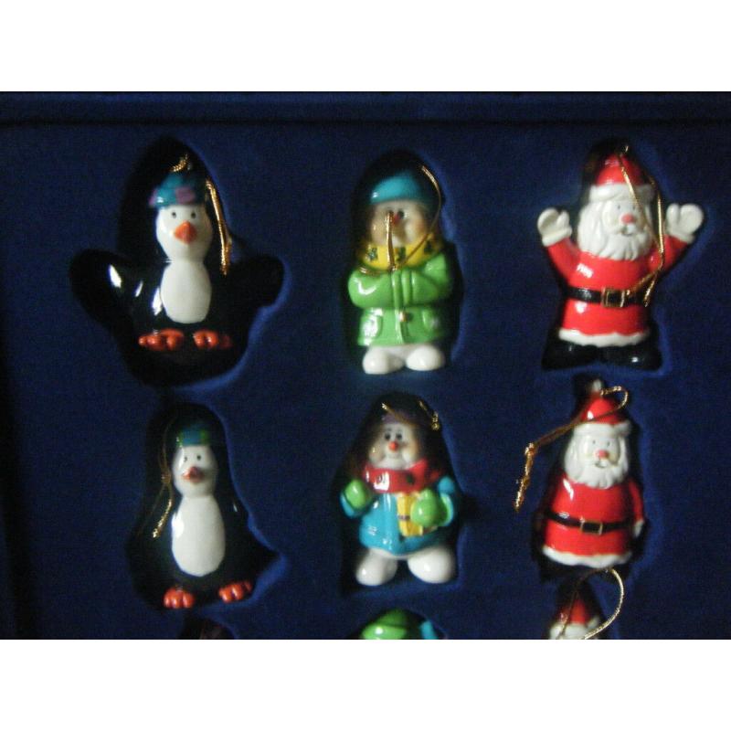 Set of 12 (Polyresin Christmas Characters) Tree Hangers. 11 are fine 1 needs hanger.