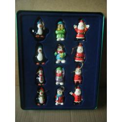 Set of 12 (Polyresin Christmas Characters) Tree Hangers. 11 are fine 1 needs hanger.