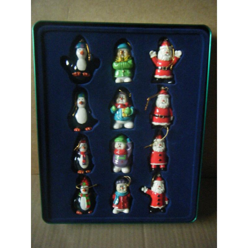 Set of 12 (Polyresin Christmas Characters) Tree Hangers. 11 are fine 1 needs hanger.