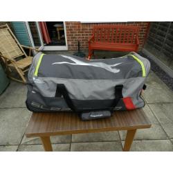 A Slazenger cricket bag with wheels