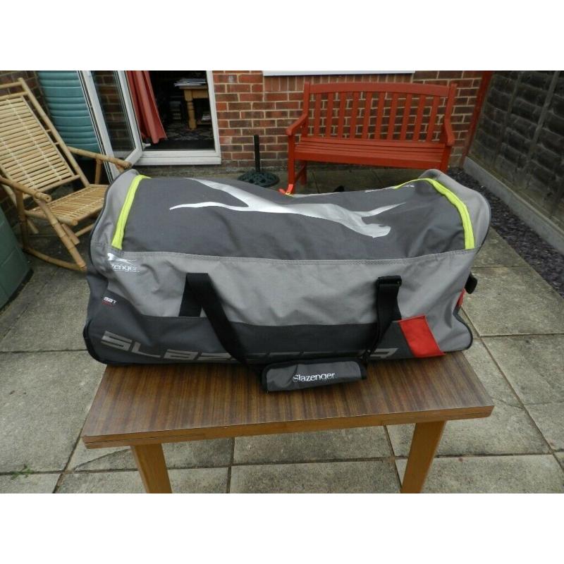 A Slazenger cricket bag with wheels