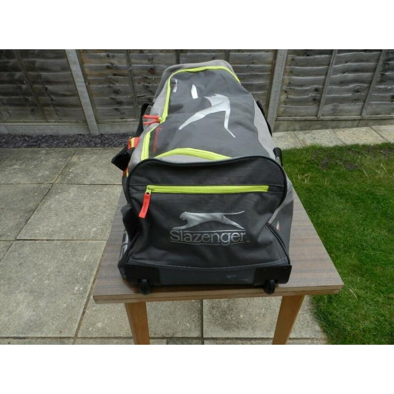 A Slazenger cricket bag with wheels