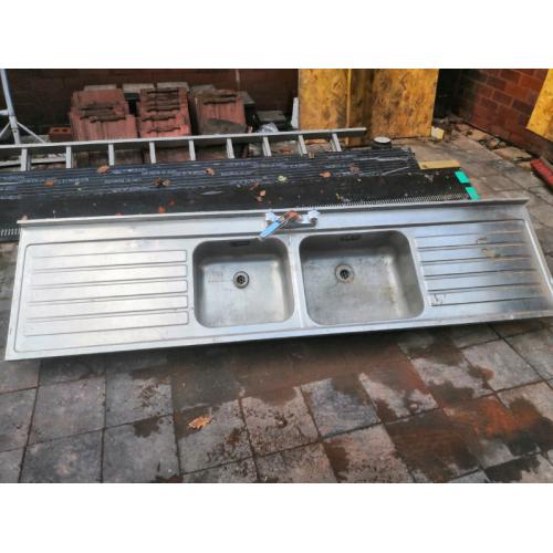 Large double sink double drain with taps attached