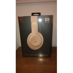 Rose gold beats wireless headphones