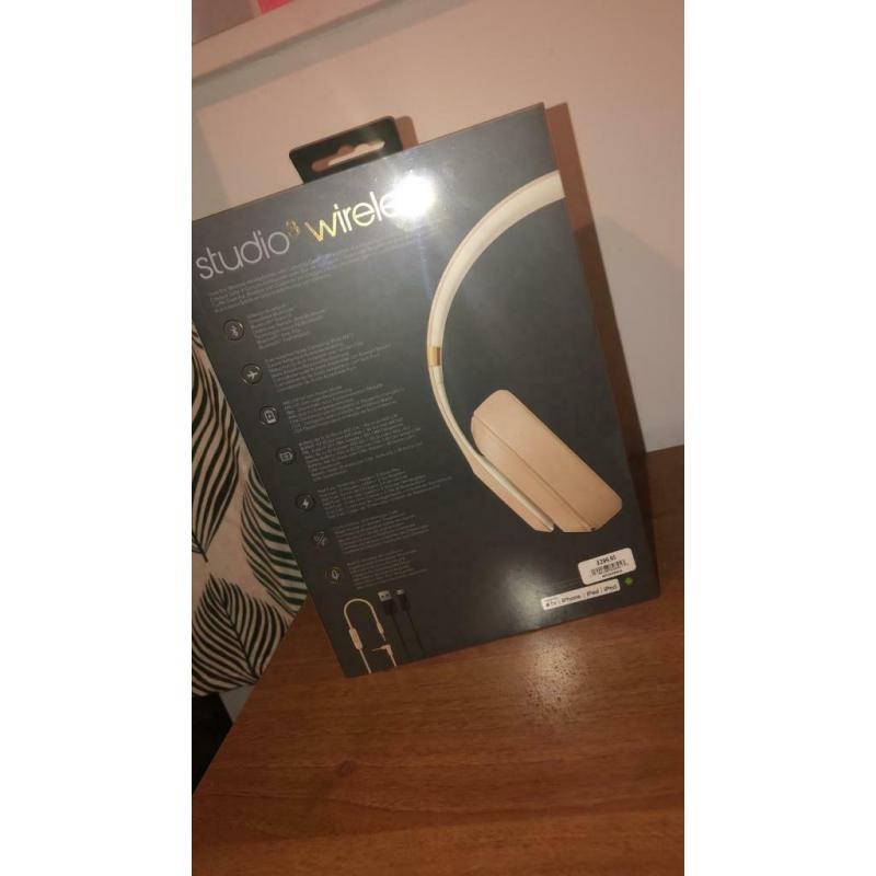 Rose gold beats wireless headphones