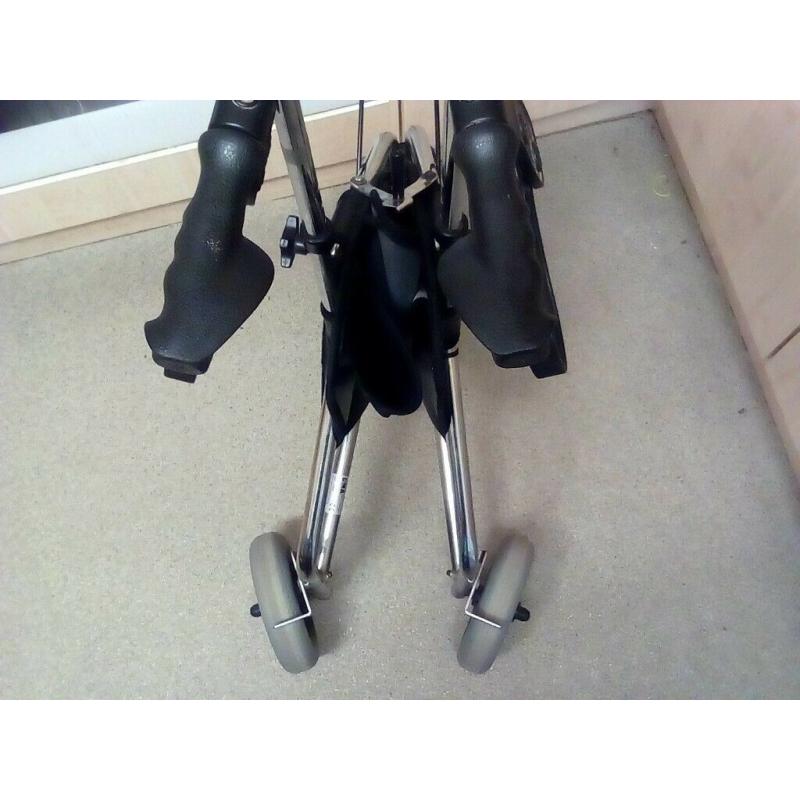 three-wheeled rollator , ,practically new,with bag