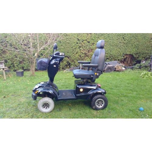 Free rider land ranger large mobility scooter.