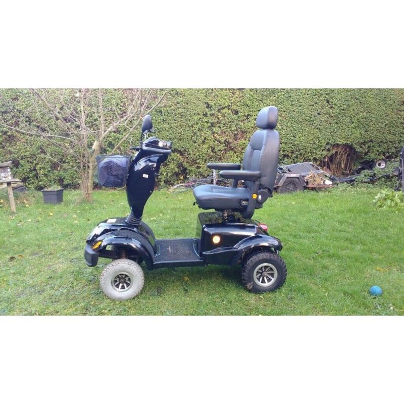Free rider land ranger large mobility scooter.