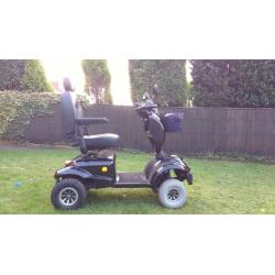 Free rider land ranger large mobility scooter.