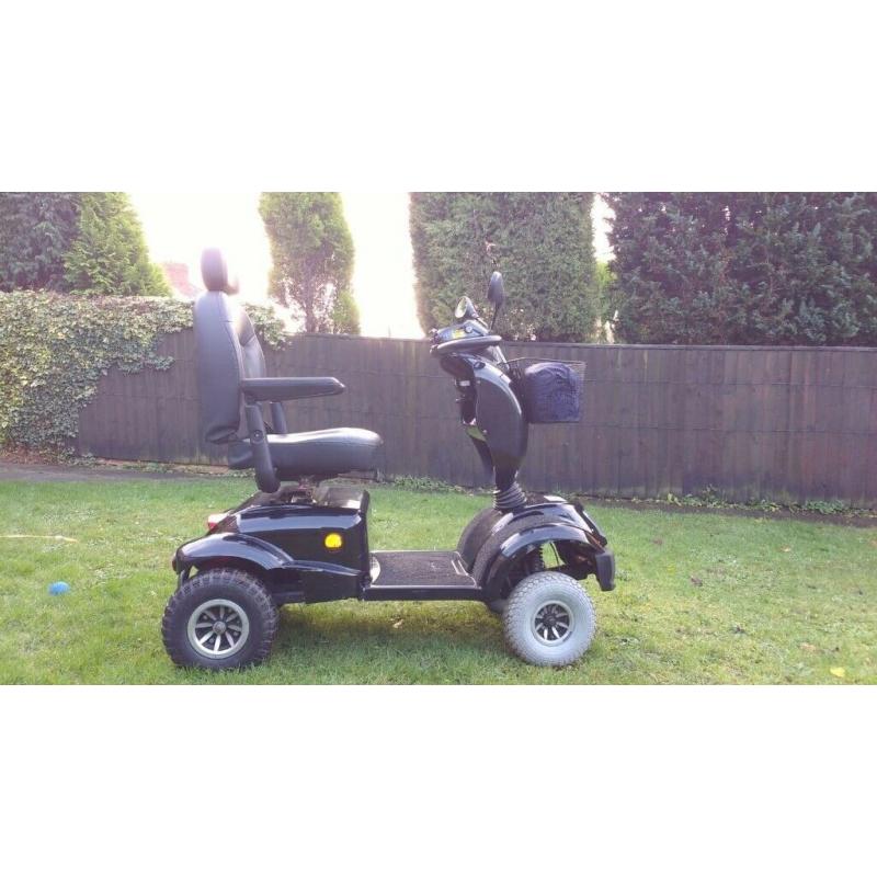 Free rider land ranger large mobility scooter.