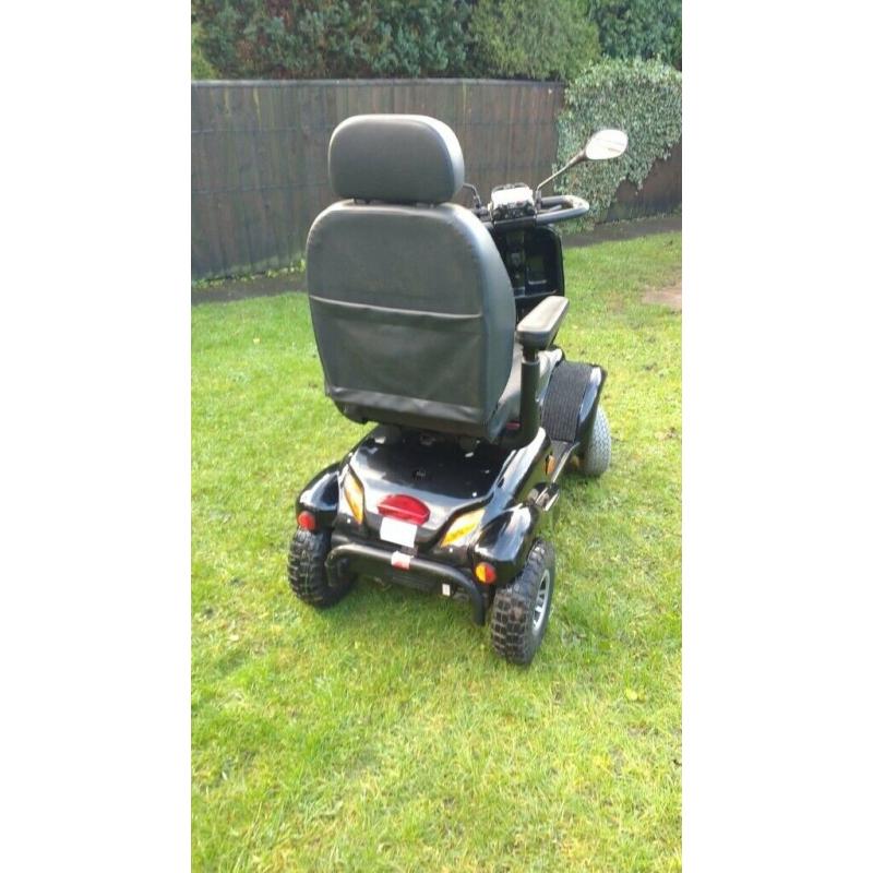 Free rider land ranger large mobility scooter.