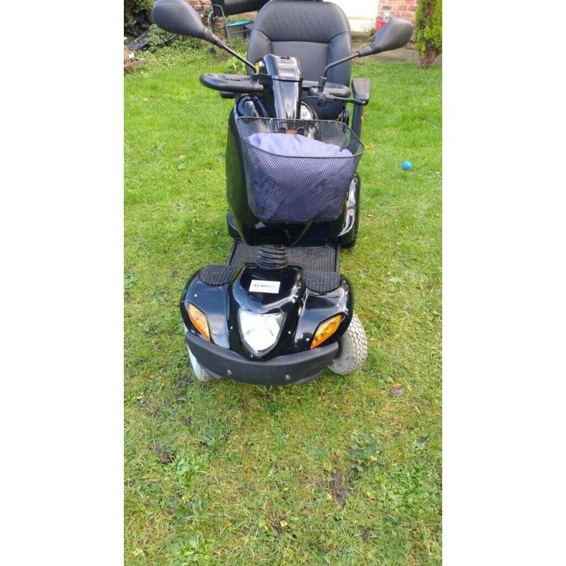 Free rider land ranger large mobility scooter.