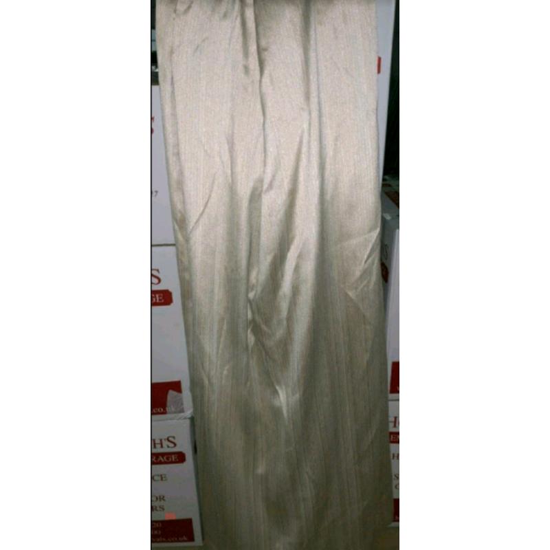 Curtains - Quality Brownish Fabric Curtains. The sizes are between 220
