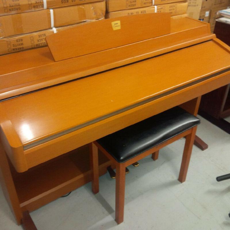 Yamaha Clavinova CLP-230 Digital Piano in cherry / oak finish and matching stool