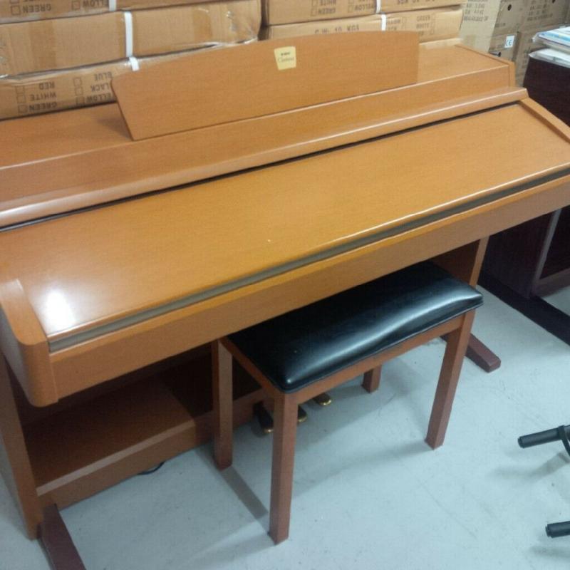 Yamaha Clavinova CLP-230 Digital Piano in cherry / oak finish and matching stool