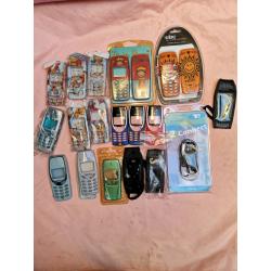 14 Nokia 3310 & 8210 phone covers, 3 leather cases etc.
