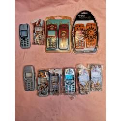14 Nokia 3310 & 8210 phone covers, 3 leather cases etc.