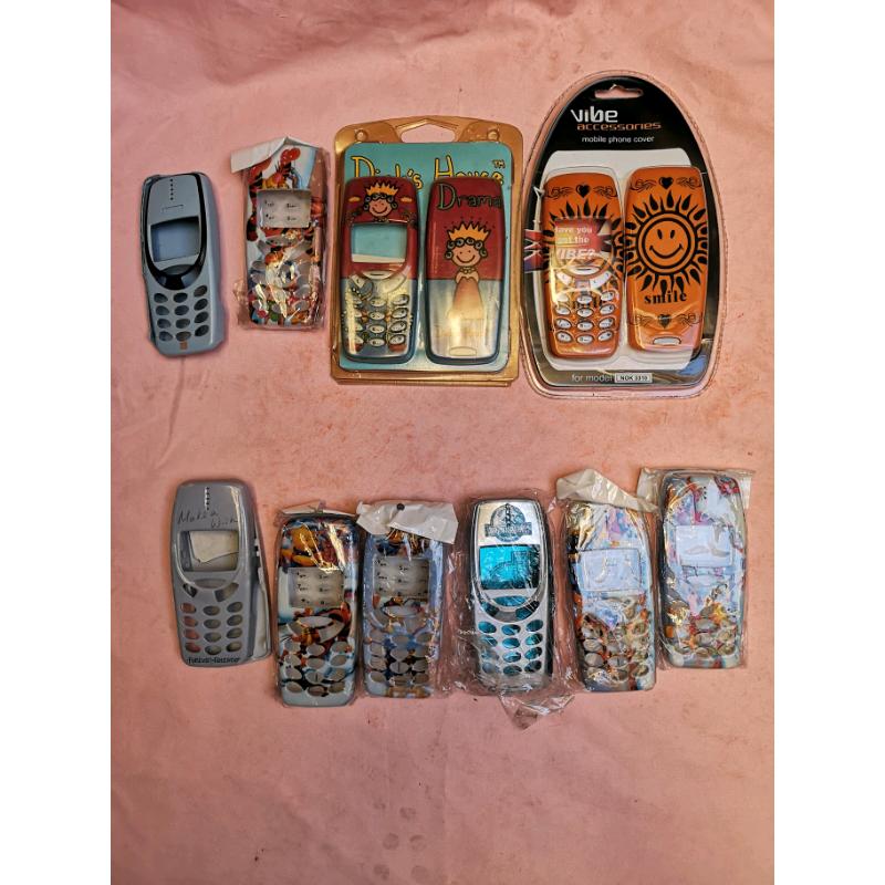14 Nokia 3310 & 8210 phone covers, 3 leather cases etc.