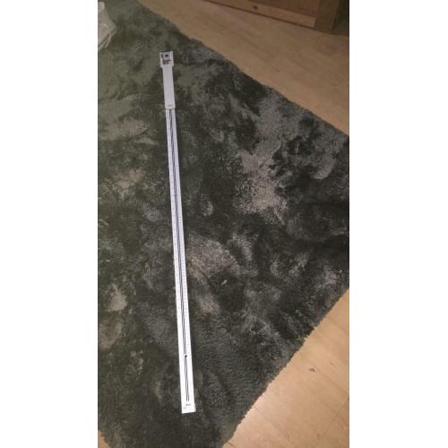 Wall mounted extendable height measure