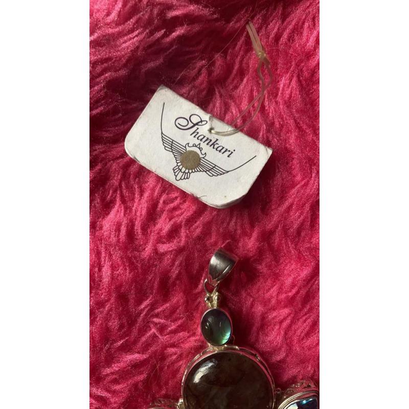 The dark side of the moon pendant.