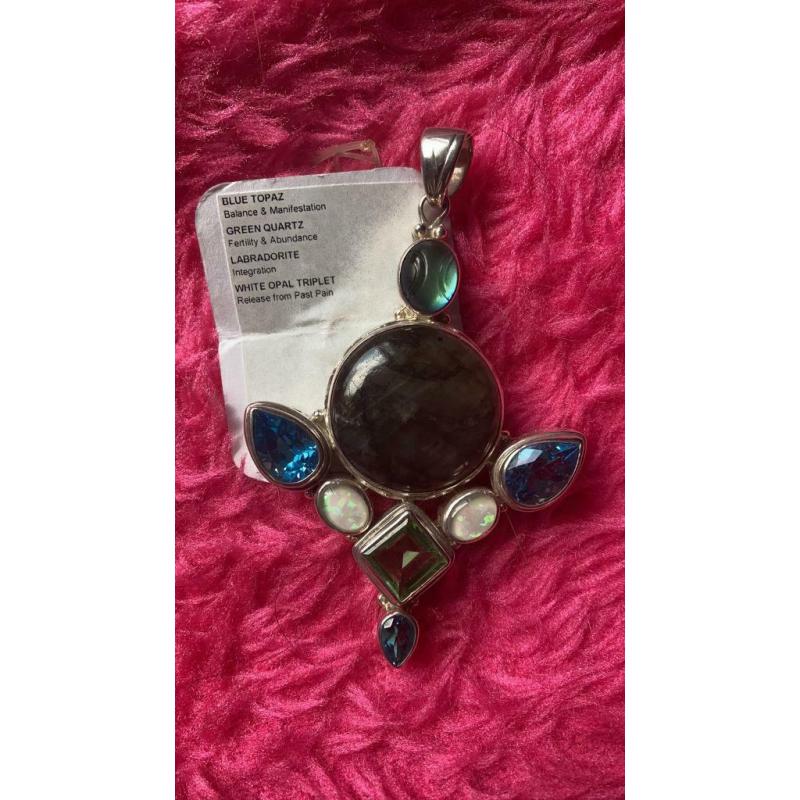 The dark side of the moon pendant.